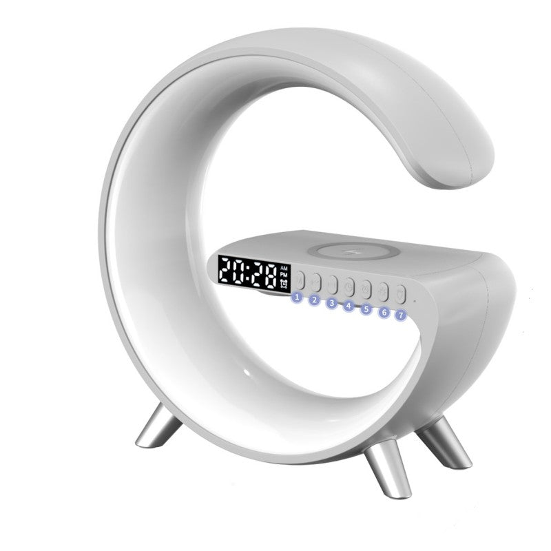 Aura G G-shaped lamp in white with wireless charging pad and clock
