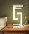 Levitate anti-gravity desk lamp with plant on top shelf