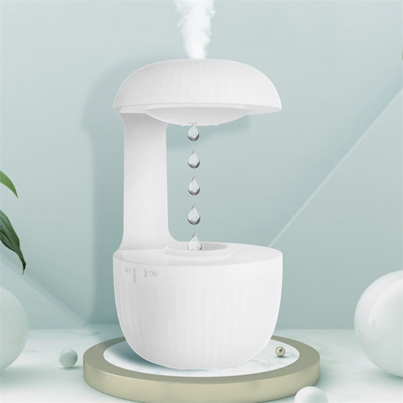 Drift anti-gravity water drop humidifier on a table with mist